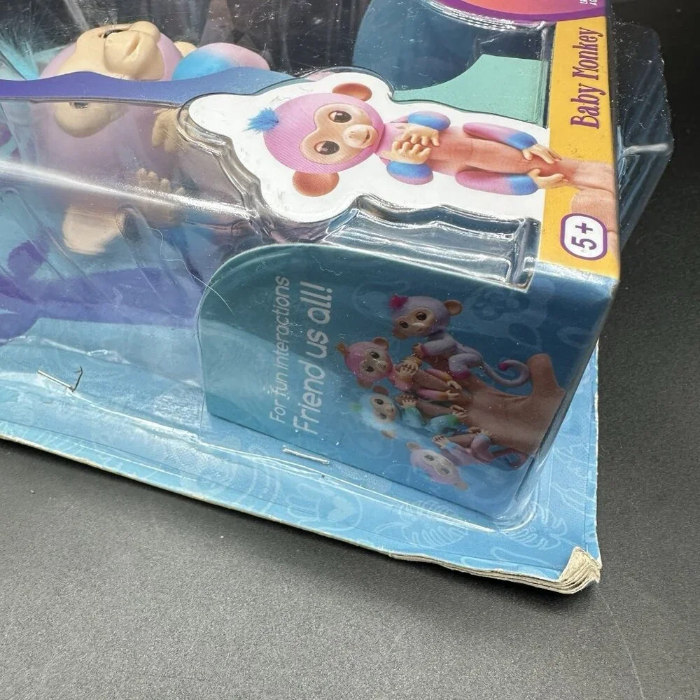 WowWee Fingerlings Baby Monkey Interactive Pet Candi Pink & Blue 40+ Sounds